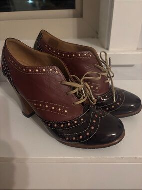 John Fluevog Two-Tone Burgundy and Black Brogue Lace-Up Heels